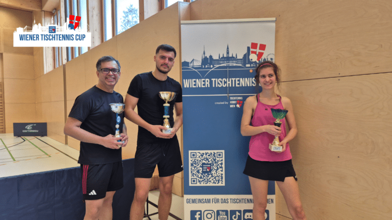Jubelnde Gewinner:innen beim Wiener Tischtennis Cup: Teilnehmer:innen strahlen vor Freude über ihren Sieg an der Tischtennisplatte.